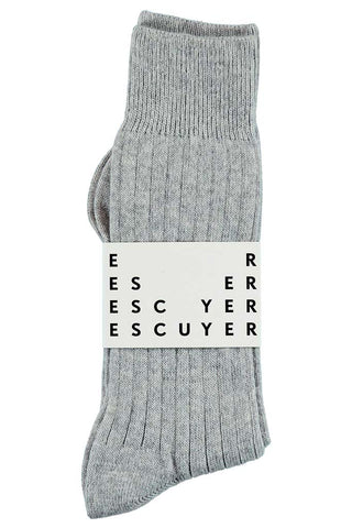Every wardrobe needs these cozy and soft ribbed-knit socks from Escuyer. The versatile style is made from light grey cashmere and goes up to the calves. Escuyer's socks are manufactured at a great family-owned factory in Portugal. 