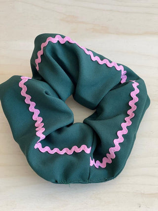 There's no better way to emulate '90s styling than with a scrunchie in your high ponytail, and By Adushka's multicolored one is our pick for this season. Our scrunchies are all about 97% up cycled since the fabric is a material that was destined for the landfill. The other 3% (or less) that’s not up cycled, is the new elastics, thread, and in some cases the labels.   They are handmade from fabric straps by our tailor in Switzerland Elif from scraps of modified items and from recycled garments.