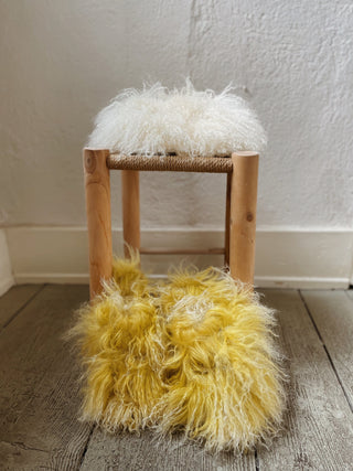 The iconic furry slippers, much loved by our Karin, CEO and Founder of By Adushka. Anyone who knows her will think of her when they see these slippers. Made entirely by hand in an atelier in central Italy, they are a unique piece that will stay with you for many years.